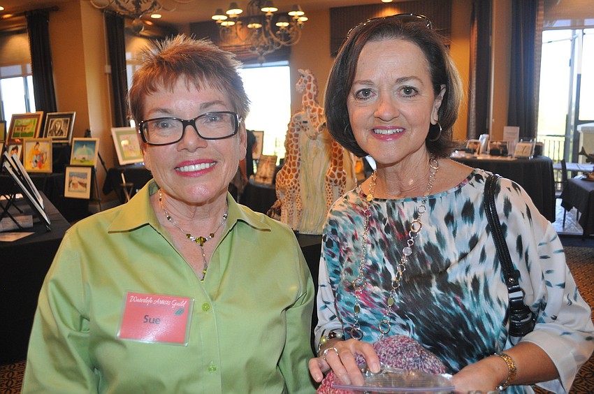Sue Kerr, who makes clay sculptures, with Anita Johnston