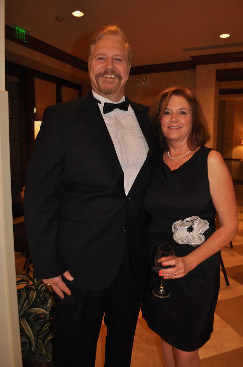 Braden Woods residents Blane Turpin and his wife, Dot, represented the benefiting charity, The Food Bank of Manatee.