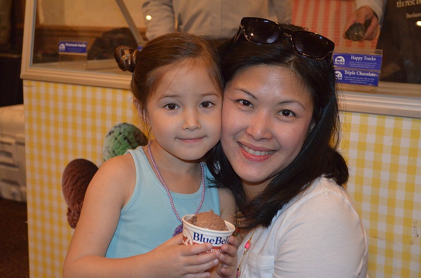 Yen and Adelle Reed try some ice cream.