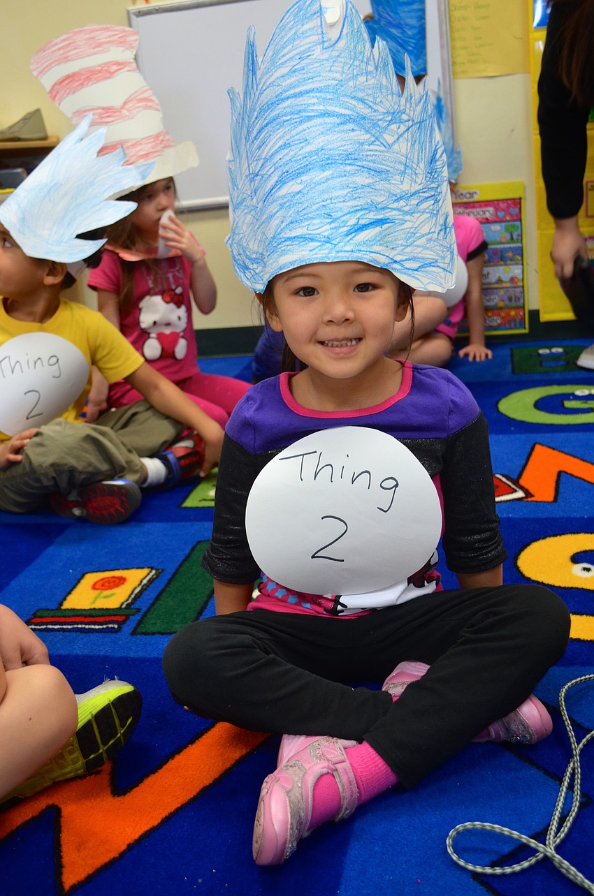 Arryn Mason, 4, plays dress up for the day.