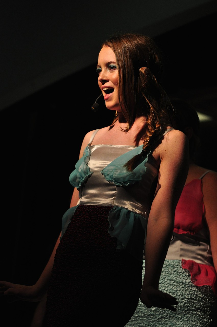 Eight-grader EmmaLee Holmes plays a mermaid.