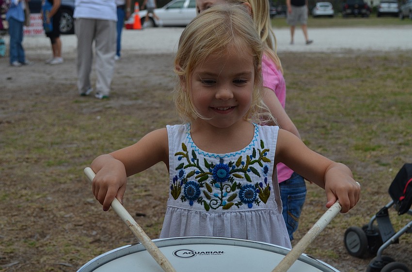 Grace Bailey plays a snare drum.