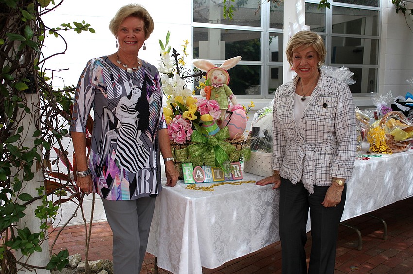 Betty Jo Haas and Ruth German stand with the baskets that will later be raffled off during the show.