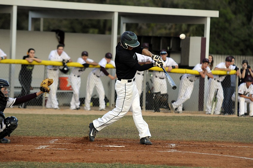 Lakewood Ranchâ€™s Justin Greenaway makes contact in the top of the first inning.