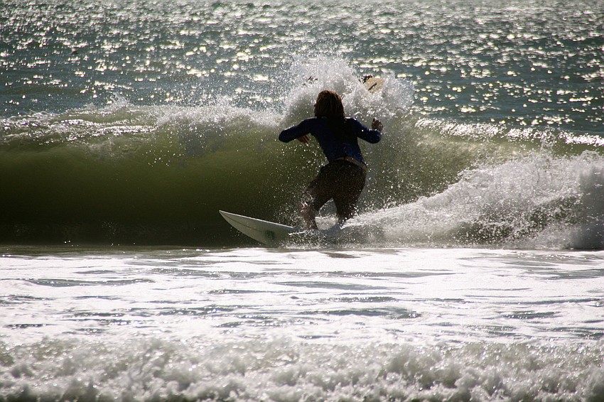 Surfers at Lido Beach.