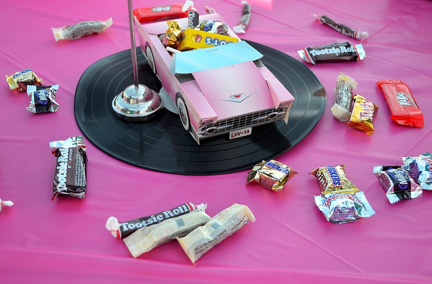 The table decorations stuck to the nightâ€™s â€œBack to the 50sâ€ theme.