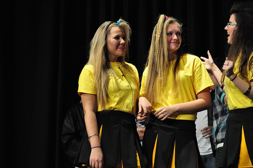 Taylor Karp, Jansen Humphrey and Mandy Durfee play cheerleaders.
