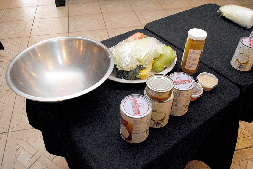 Chef Lam Lumâ€™s demonstration table at Taste of Asiaâ€™s cooking class