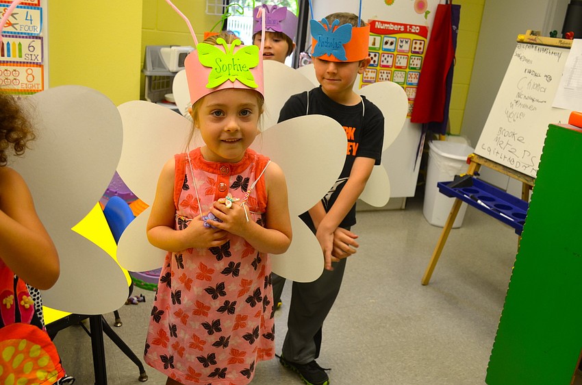 Sophie Duell shows off her butterfly costume.