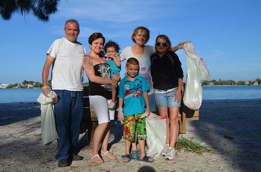Eddie, Siany, Amy and Alize Sandoval with Maryel McKeown and Susan Sandoval make the clean up a family affair.