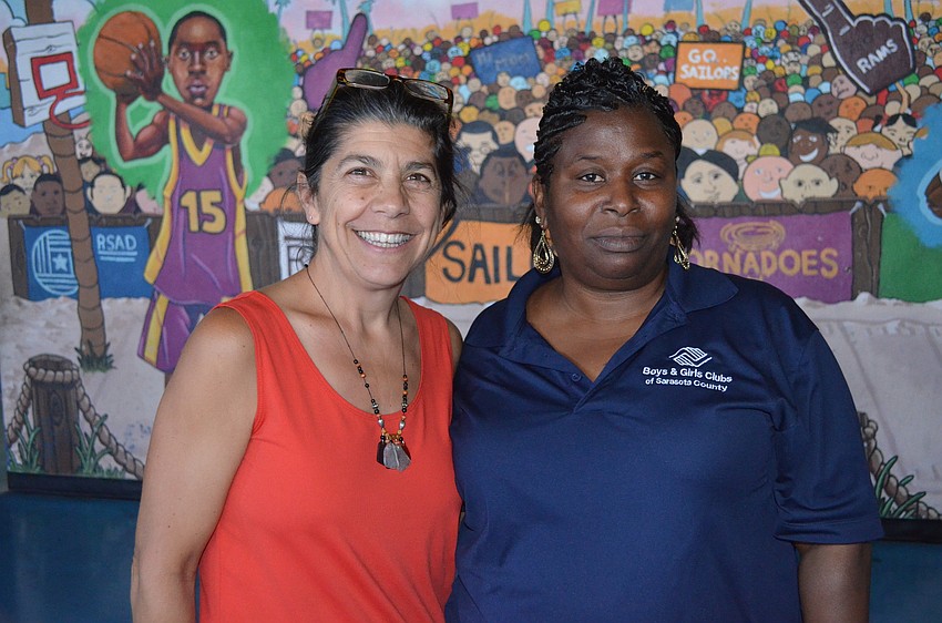 Nancy Pantano from All Faiths Food Bank and Boys and Girls Club Program Director Barbara Bane