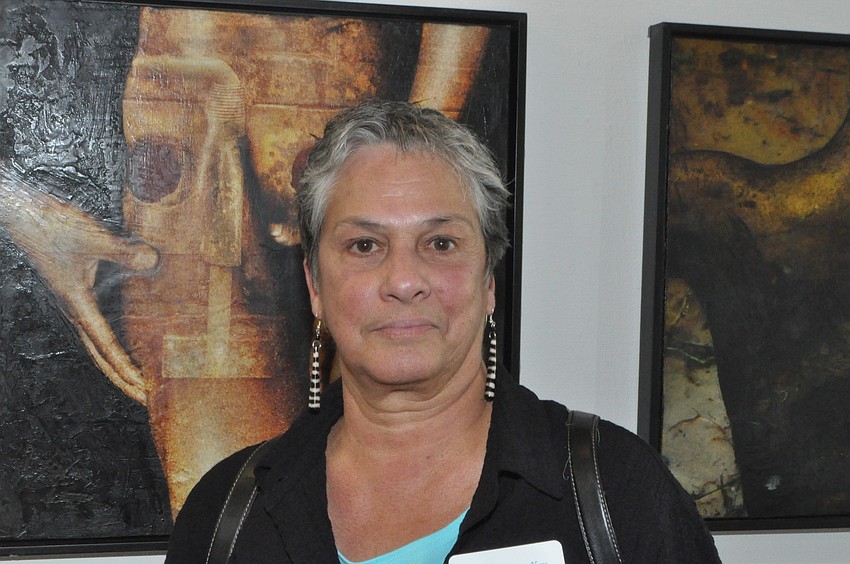 Elena DeLaVille made photographs painted with pigments in wax.