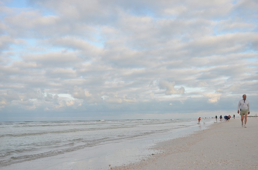 Siesta Key Beach was cool Saturday, April 6 and perfect for running.