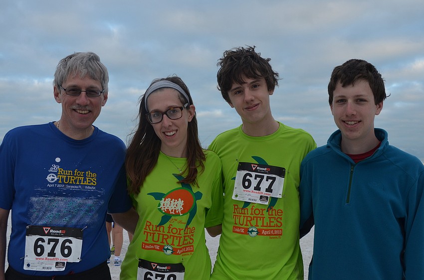 John Gilroy with his daughter Rose, friend Aidan Markham and son Alex.