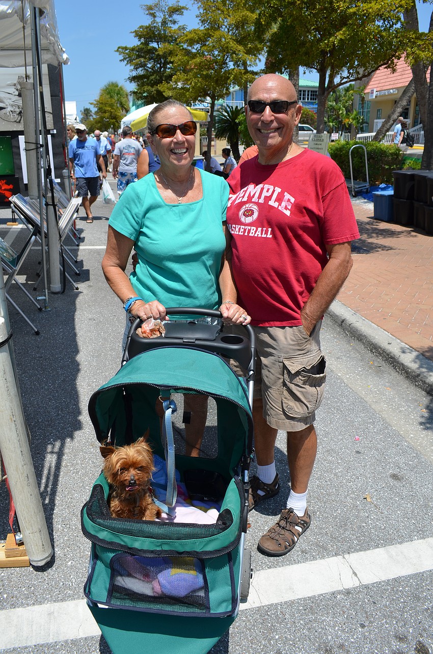 Sandy and Ron Fogel with their dog, Einstein