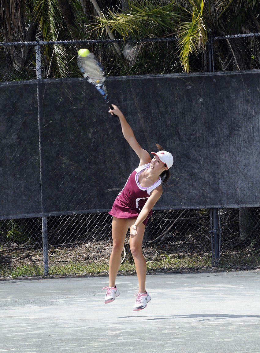 Freshman Willow Weintraub serves the ball during her first-round regional match.