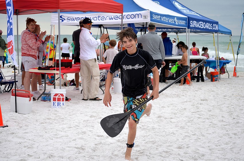 Christian Castro runs toward the finish line.