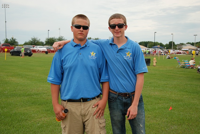 Devon Bain, 15, and Daniel Jones, 16, two teens from the Manatee-Sarasota Florida Sheriffs Youth Ranch, helped volunteer at the cookout by helping with the kids games and activities.