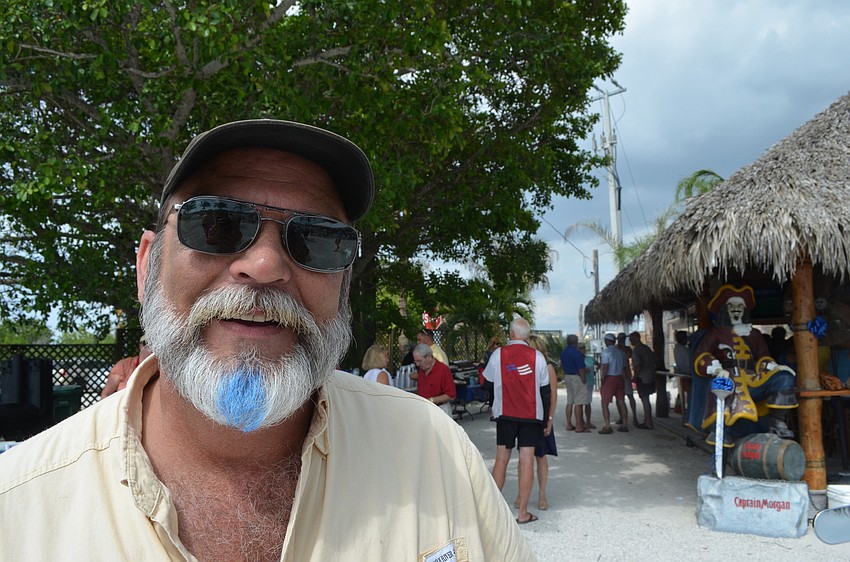Howard Minter got his beard painted blue for National Child Abuse Prevention month, which is April.