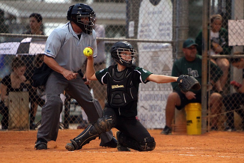 Lakewood Ranchâ€™s Marissa â€œTalliâ€ Sharp, No. 11, gets ready to throw the ball back towards the mound.