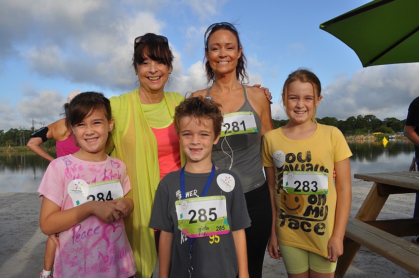 (Front) Siblings Sophia, Cooper and Isabella Carpenter; (Top) Diane Kah, the childrenâ€™s grandmother, and Talley Carpenter, the childrenâ€™s mother