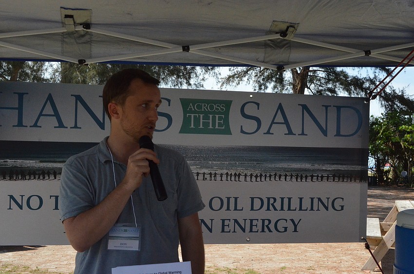 Transition Sarasota Executive Director Don Hall addresses community members.