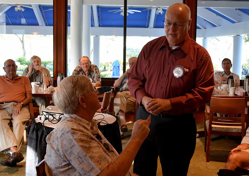 Joe Walsh oversees the clubâ€™s lottery drawing