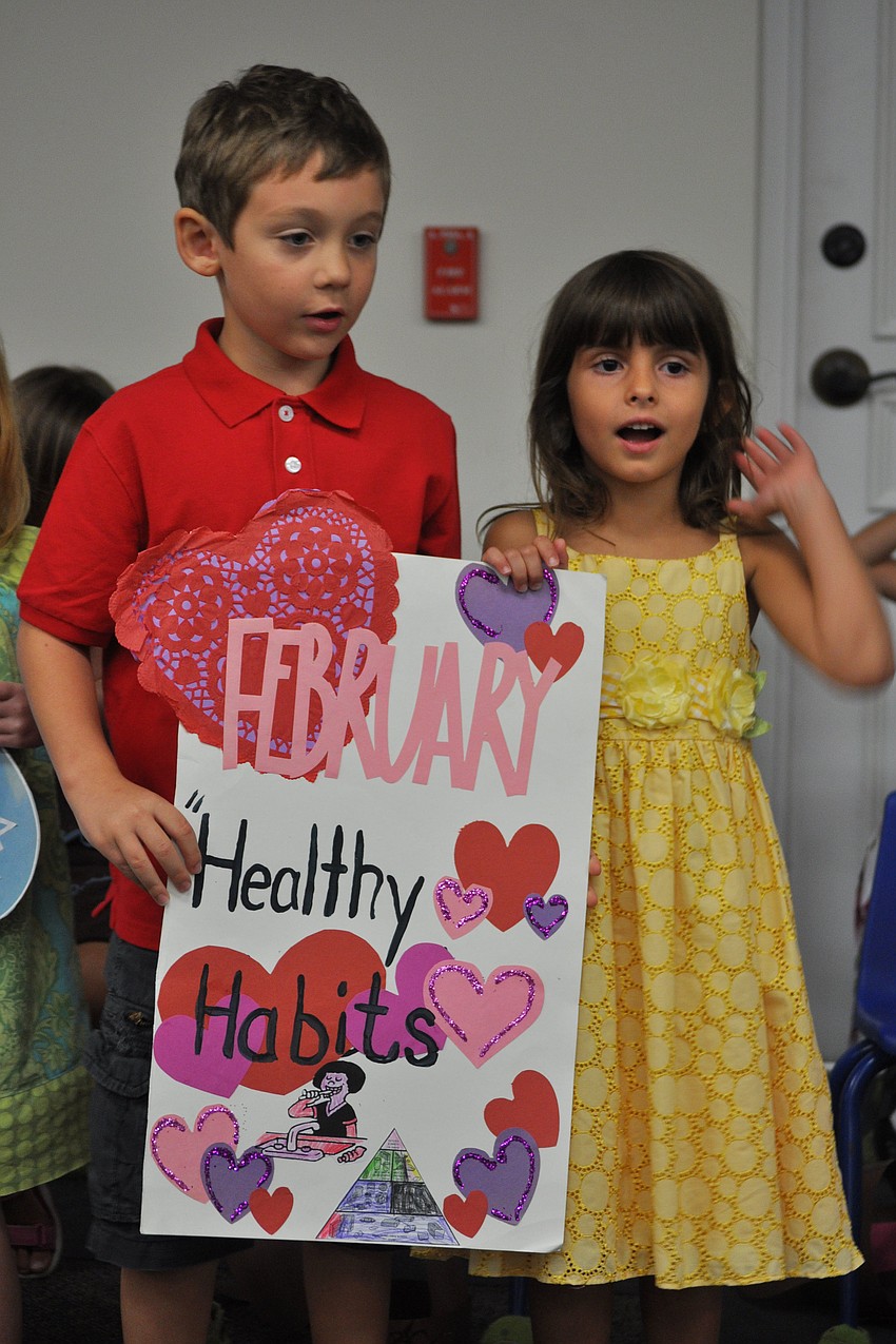 Mason Plese and Grace Waschke, of Kiddie Academy, shared with parents about what they learned in February.