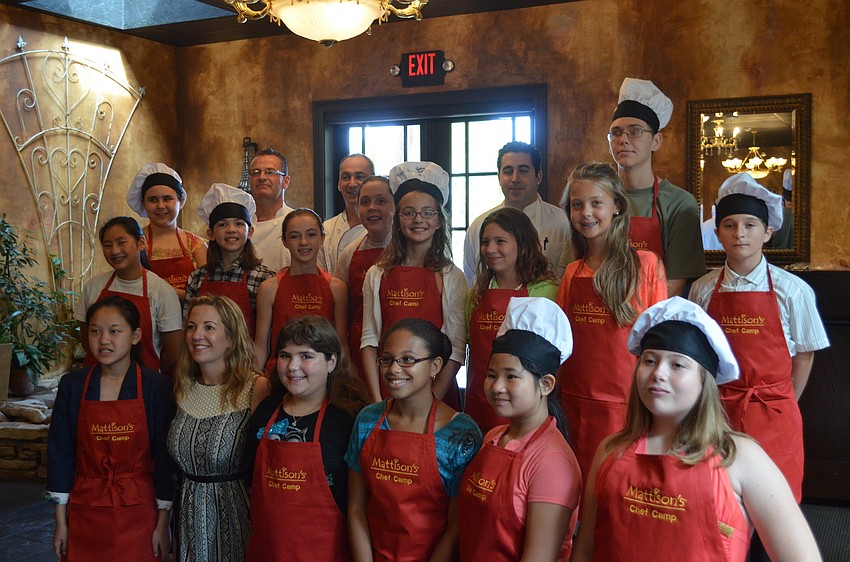 Campers receive a chefâ€™s apron and certificates for completing the Taste of Tuscany session of Chef Camp.
