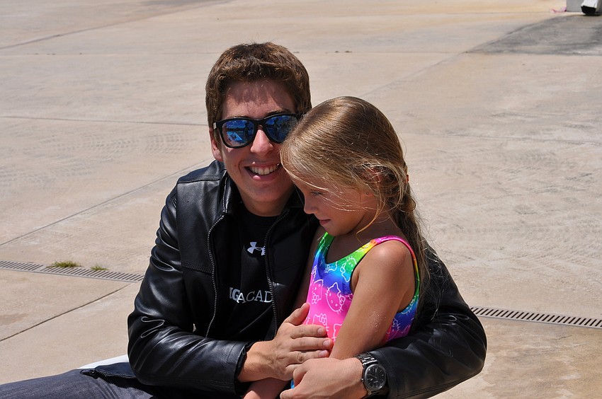 Nick Miller, a camp counselor, with his sister, Rose