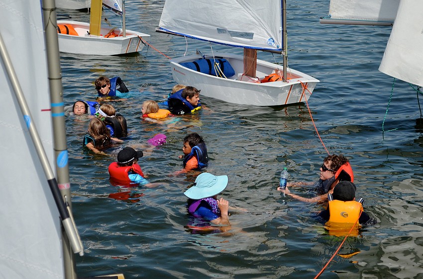 The campers swim in the bay.