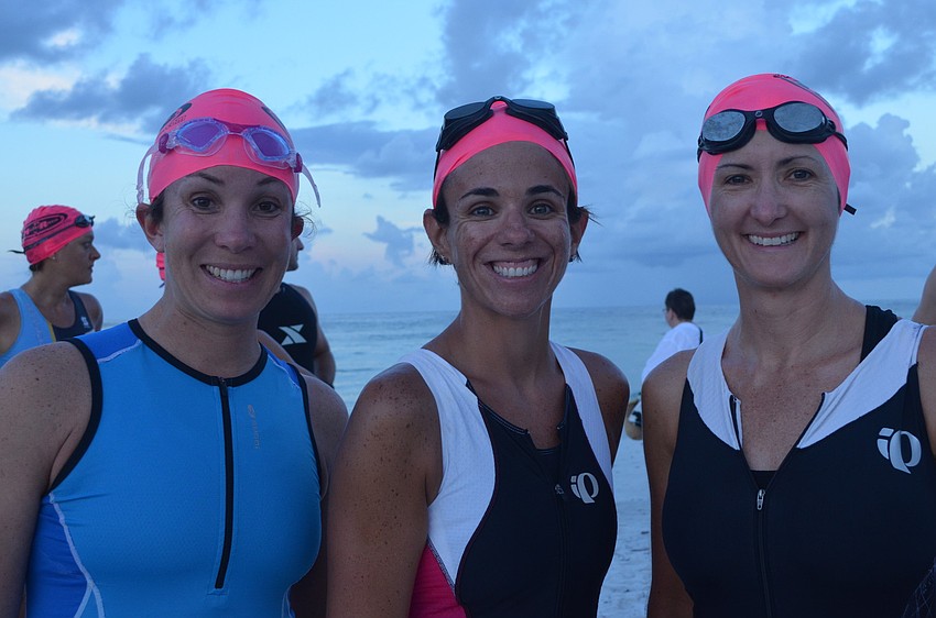 Kim Fitzgerald, Kelly Brown and Angie May participate in the Olympic Triathlon.