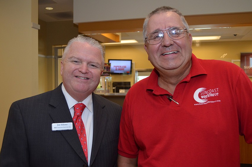 Joe Sikora of BB&T Insurance and Peter Kizin of Suncoast Workforce