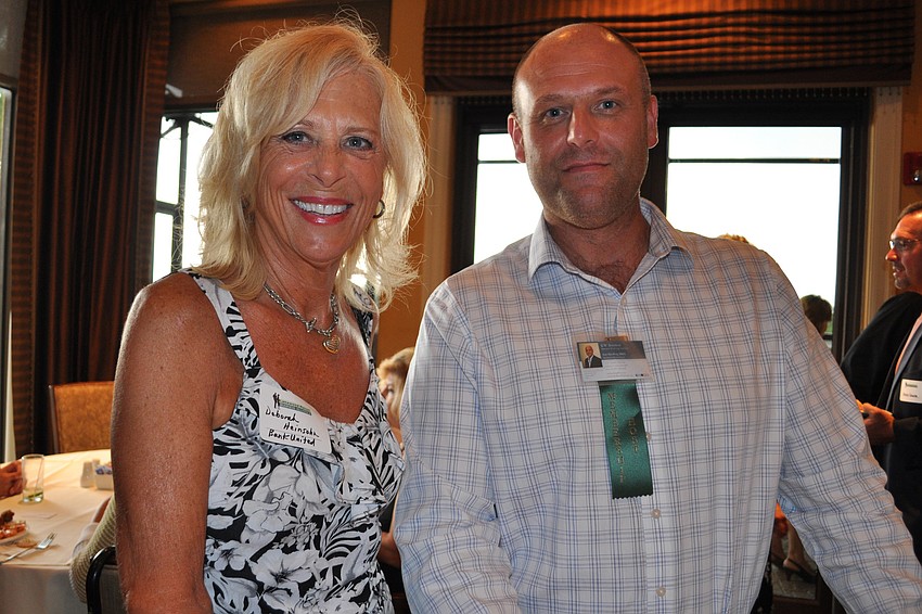 Deborah Heinsohn, of Bank United, and Ian Harding, of KW Business
