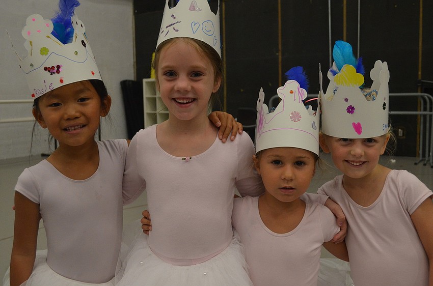 Roselyn Wagner, 6, Siena Cook, 6, Elise Settini, 3, and Emma Kleppinger, 4, learn the story of Sleeping Beauty through ballet and mime.