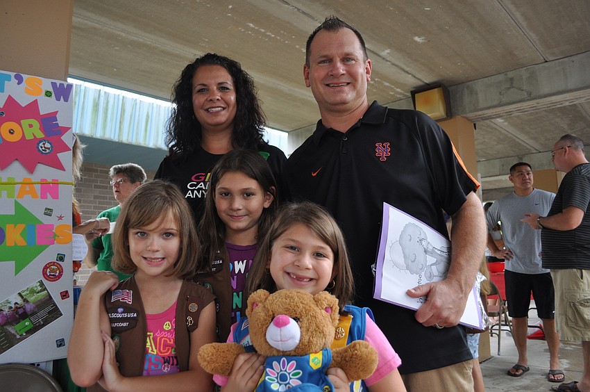 (Back) Alexis Suter and Mike Tarerico with the girl scouts, (Front) Gianna, Bella and Ginger Tarerico. All of the girls attend Tara Elementary.