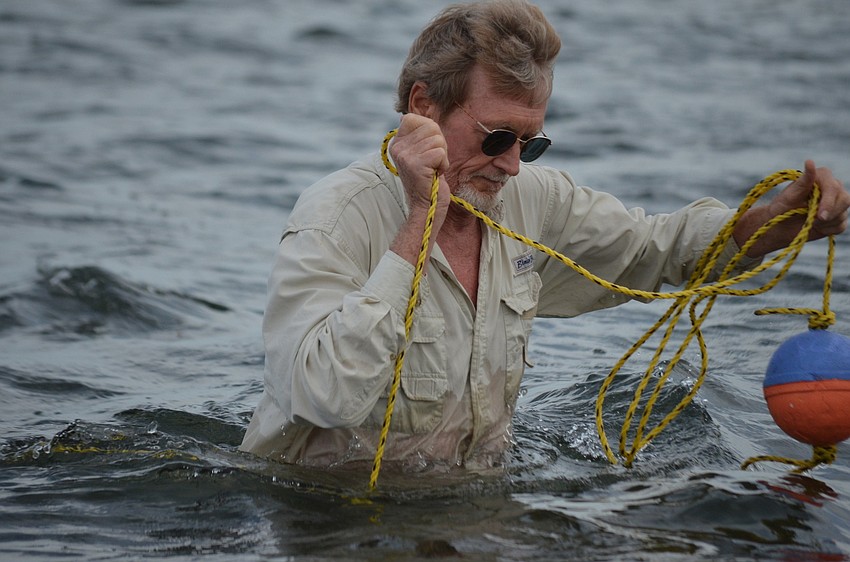Steve, from the Carefree Learner begins the scallop search.