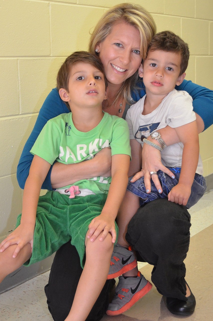 Courtney Rosenthal with her children Wes and Ace.
