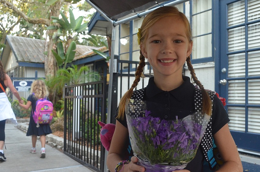 Kendall D. heads to her first day of third grade.