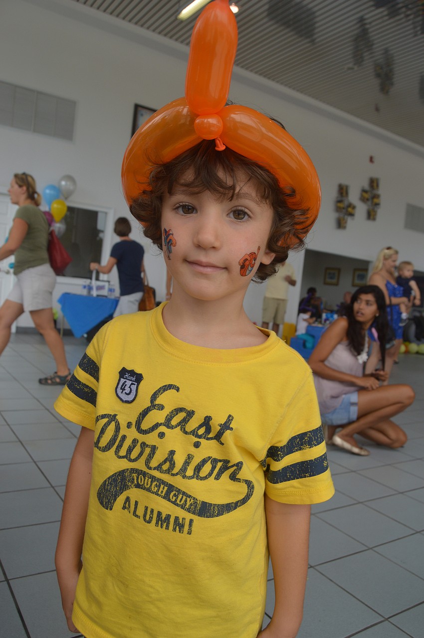 Zachary Manooshian enjoyed the sports tattoos and balloon hat.