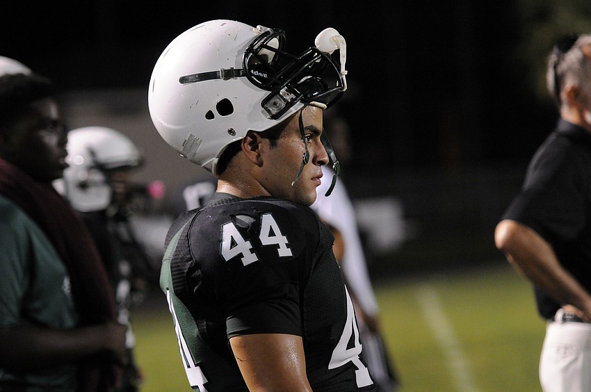 Lakewood Ranch sophomore defensive lineman Roberto Valls looks on as the Mustangs offense takes the field.