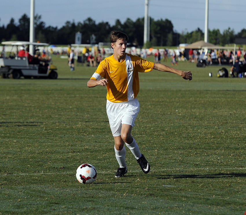 FC Sarasotaâ€™s Alex Mooney dribbles the ball up the field.