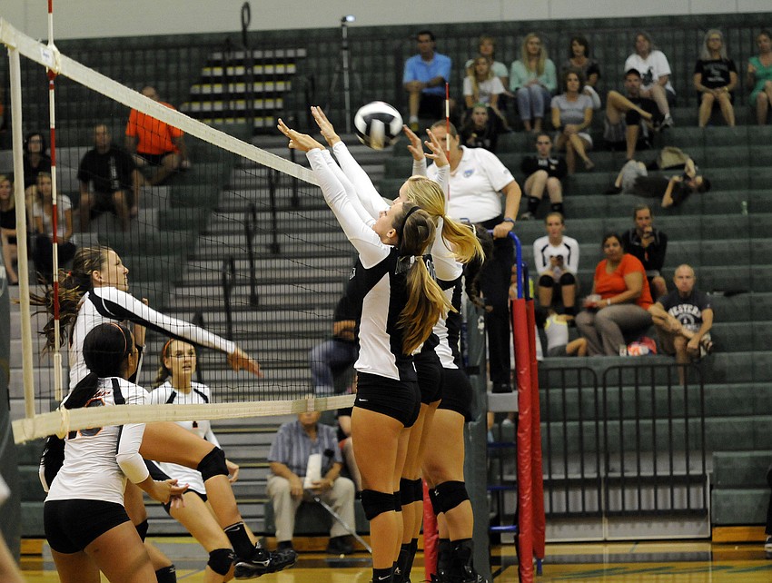 Lakewood Ranchâ€™s Lauren Owens, Coleen Campbell and Savannah Sears block Sarasotaâ€™s Toni Mogensenâ€™s shot.