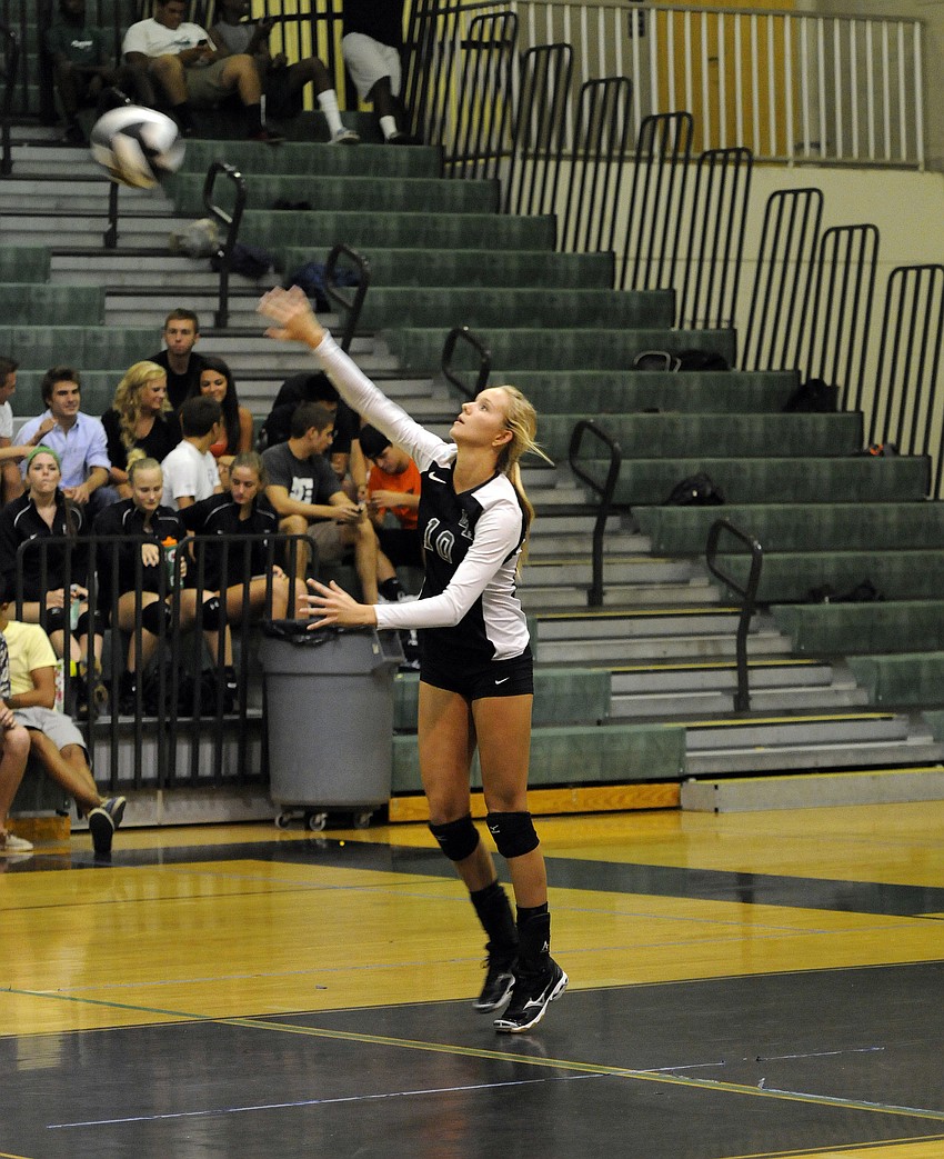Lakewood Ranch junior Coleen Campbell serves the ball in Game 1.