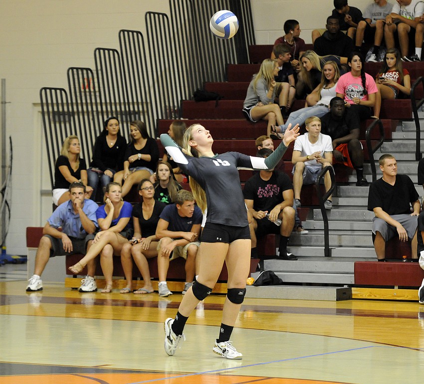 Lakewood Ranch senior Ashlyn Falahee serves the ball as the Lady Mustangs prepare to mount a comeback.