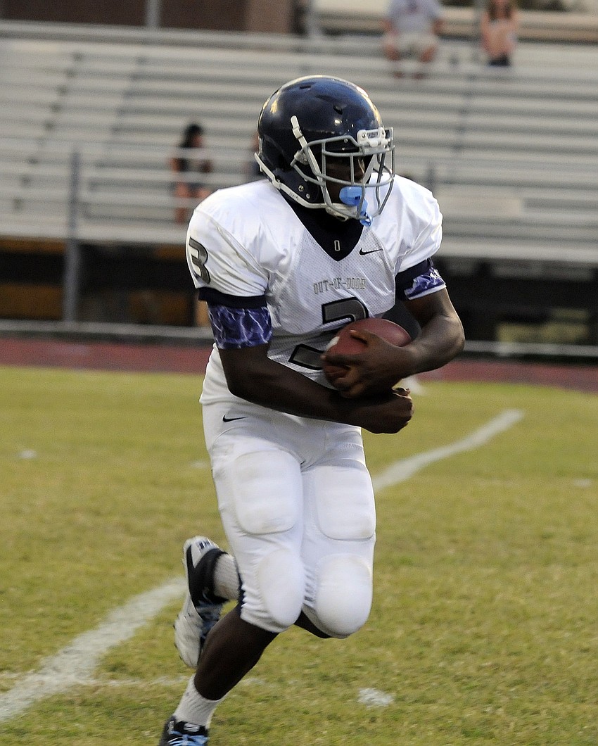 ODA freshman running back Najee Rhodes runs for a 6-yard gain.
