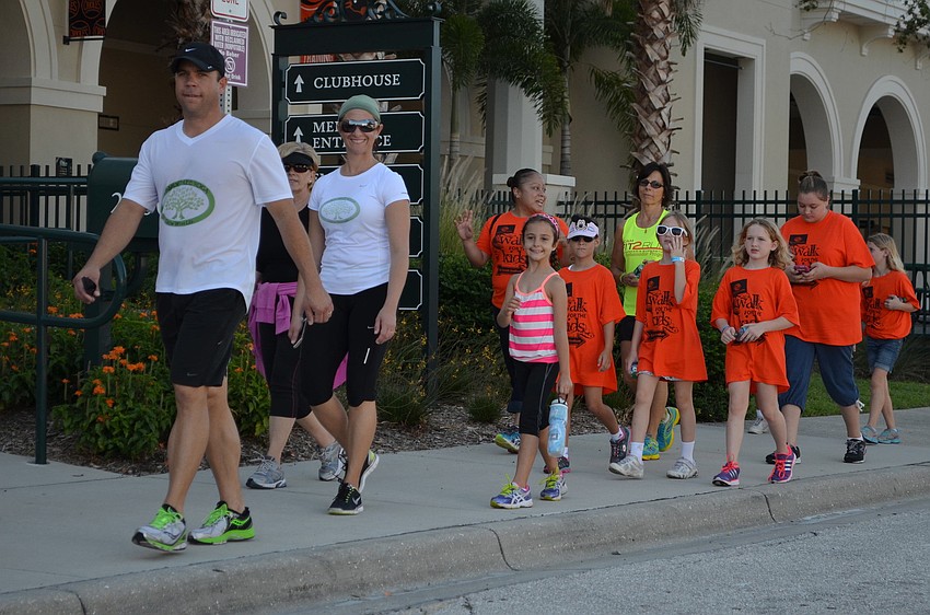 Walkers in the 2013 Walk for the Kids make their way back to the front of the stadium.
