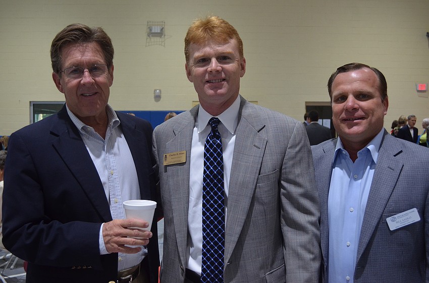Mike Doyle of the Boys and Girls Club, County Commissioner Charles Hines and President and CEO of the Boys and Girls Club Bill Sadlo