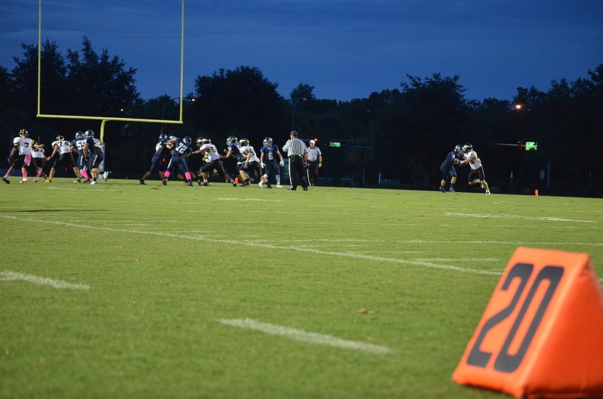 ODA tries to stop Bishop Verot from getting a touchdown.