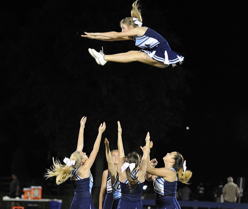 ODA senior Emma Holland flies through the air during the Thunderâ€™s halftime routine.